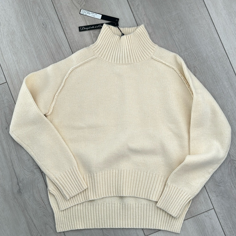 Never worn cream turtleneck